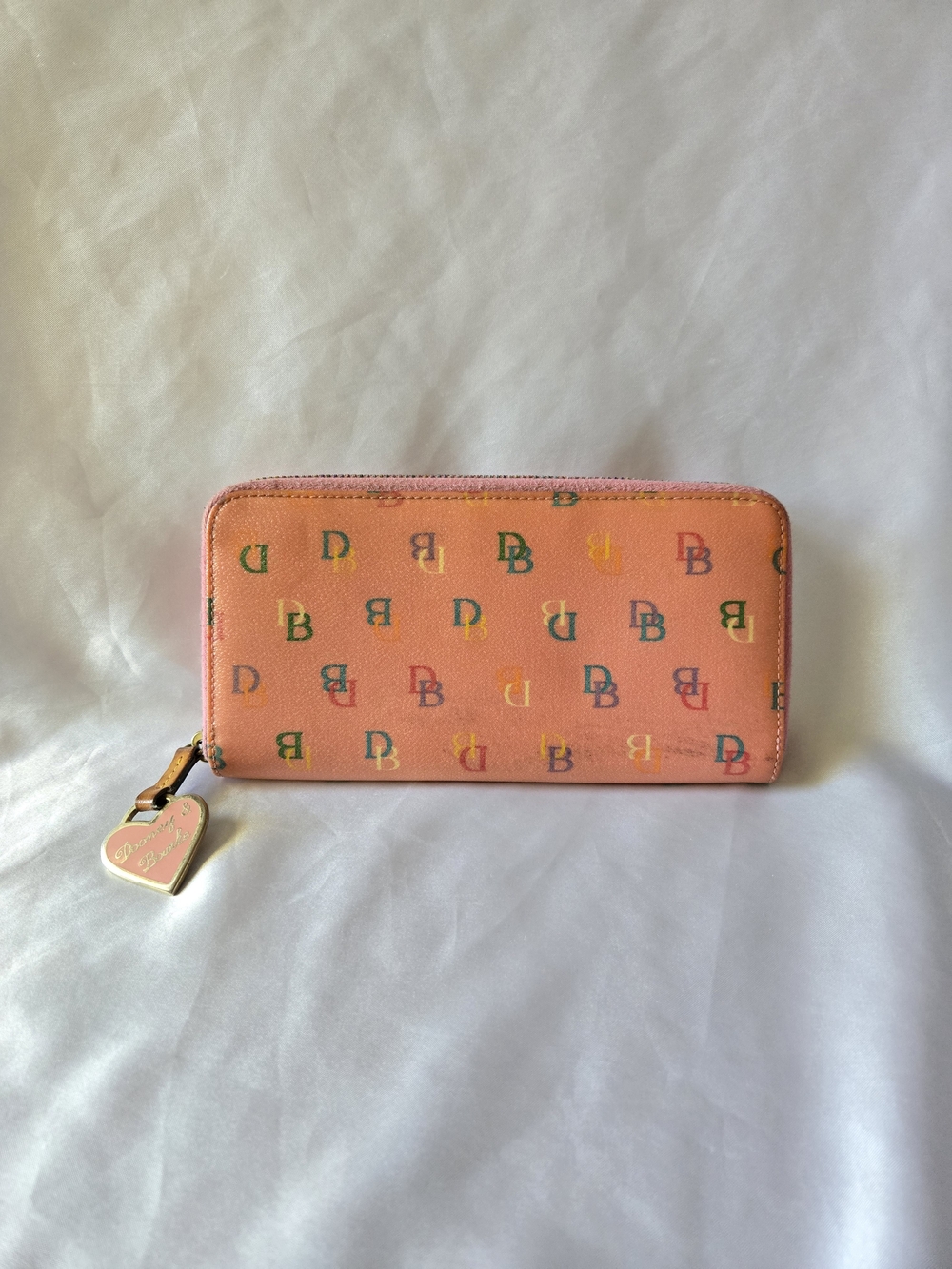 Dooney & Bourke Coral Signature Zip Around Wallet with Heart Charm